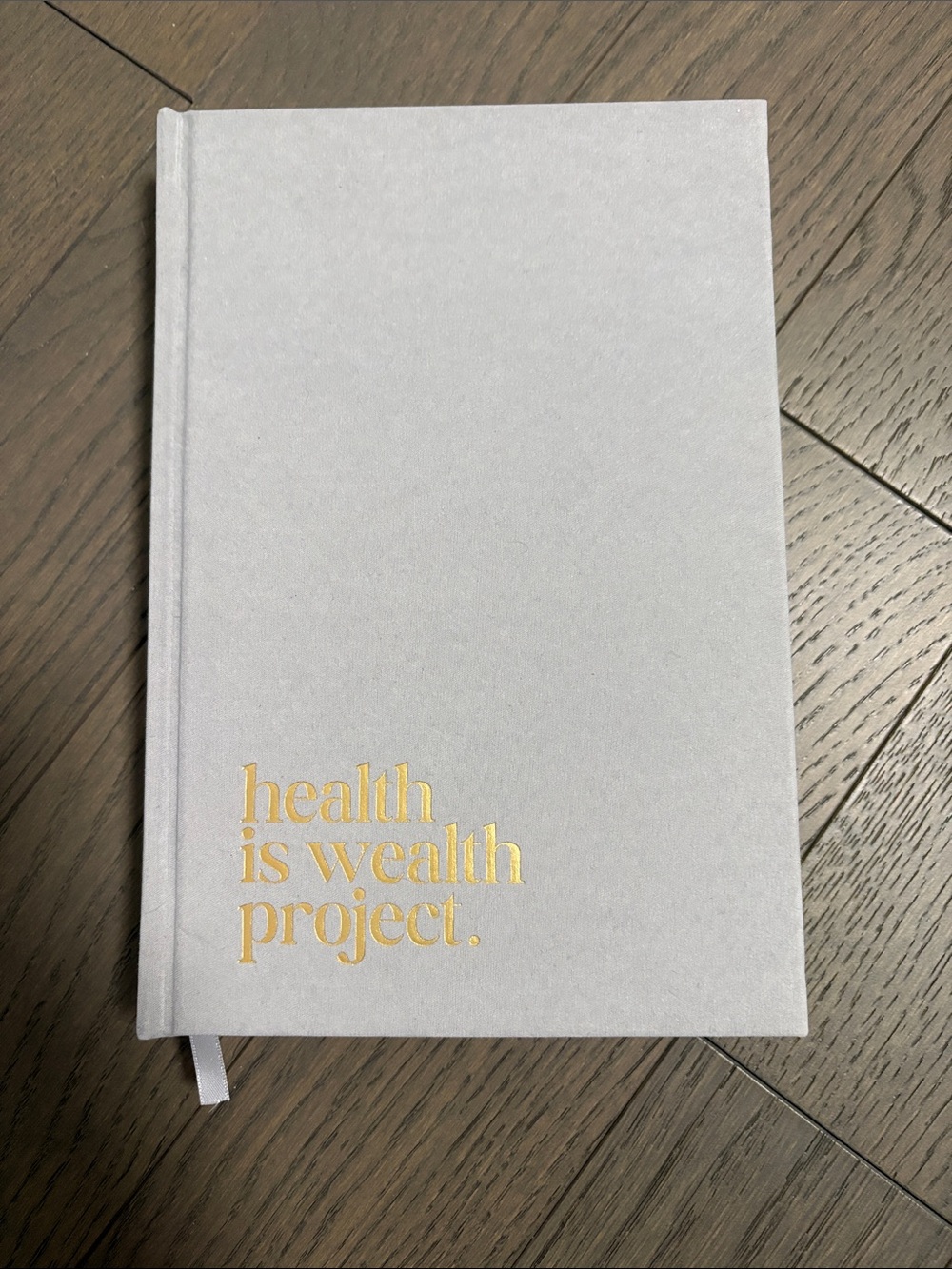 Gold Lettered White Hardcover Journal - "health is wealth project."